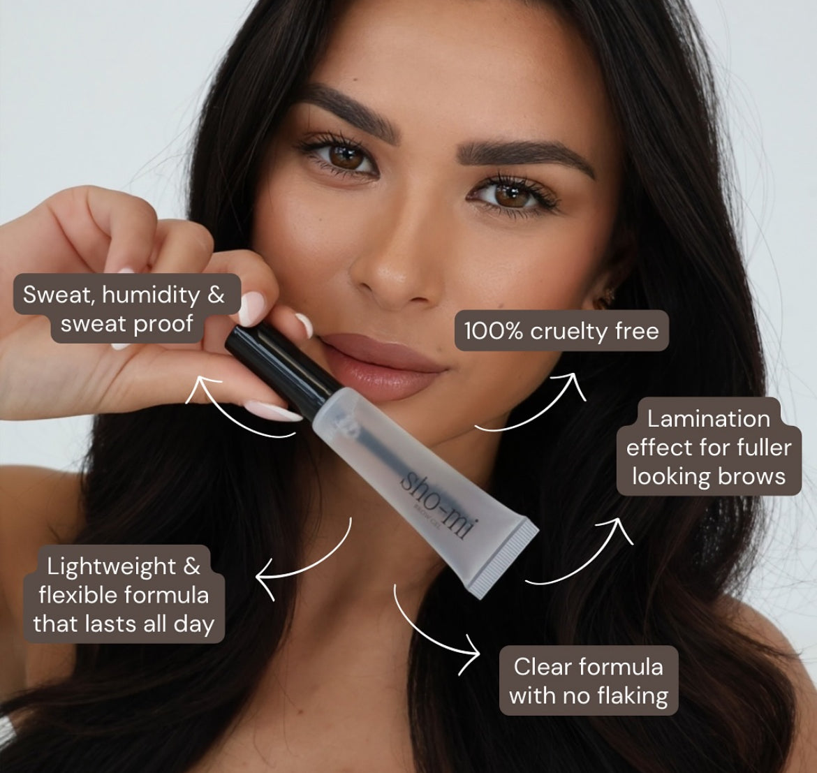 Woman holding a brow product with text highlighting features