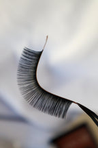 False eyelashes on a blurred background