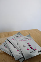 SHO-MI lint free eye gel patches on wooden surface
